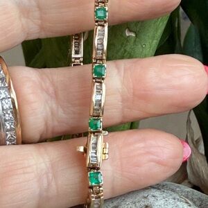14 karat gold emerald, and diamond bracelet